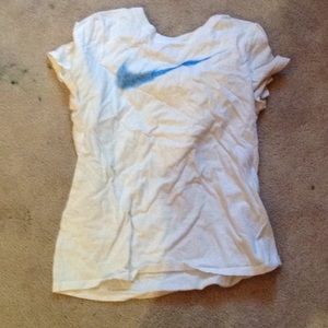 A white blue spray paint Nike shirt